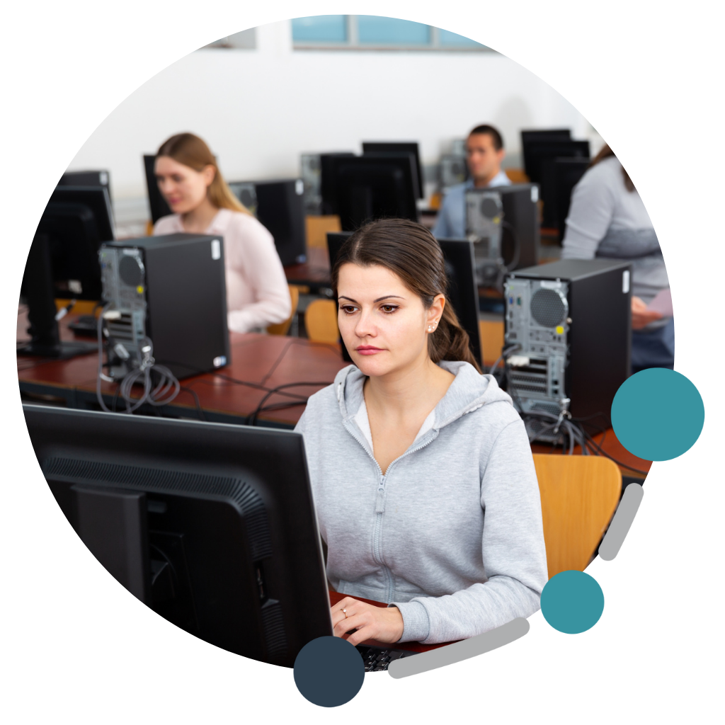 Students working on PCs in computer room